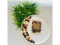 Black chocolate almonds case, milk, dulcey and white