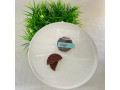 Black chocolate praline puck