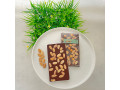 Black chocolate tablet almonds